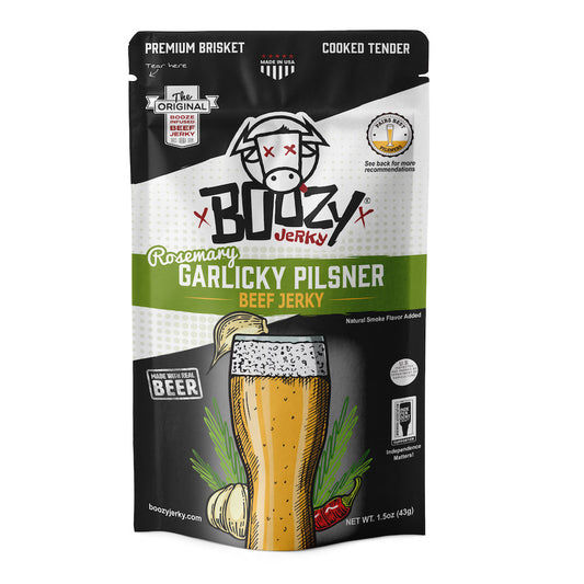 "Rosemary Garlic Pilsner Brisket Jerky – Tender beef jerky infused with pilsner beer, fresh rosemary, and garlic, finished in a buttery steakhouse style. A gluten-free snack perfect for pairing with pilsners, pale ales, or your favorite wine."